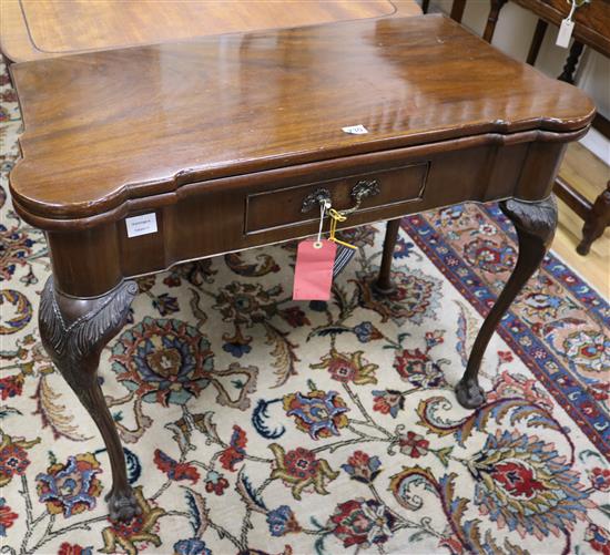 A George III mahogany folding card table, W92cm